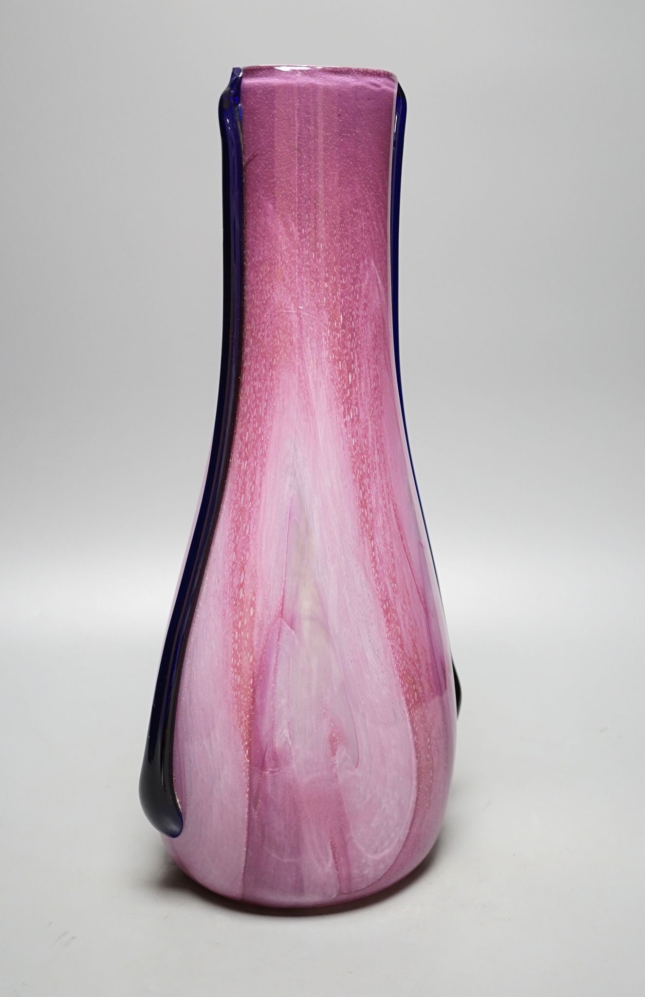 Elizabeth Graydon-Stannus, an unusual mottled pink and purple glass vase, circa 1930, of flattened pear form with applied blue lug handles, etched 'Gray-Stan' to base, 44cm high